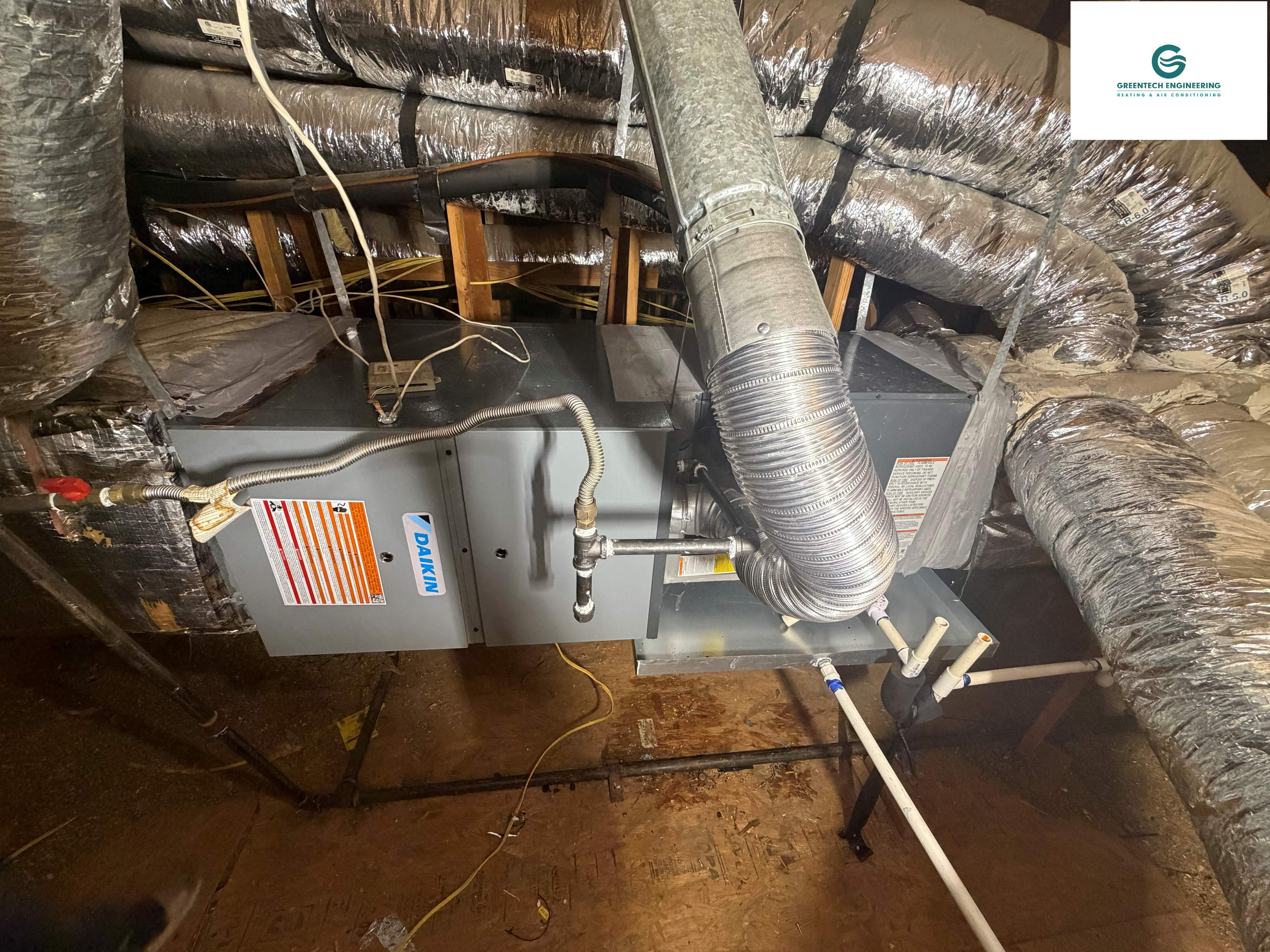 The new Daikin indoor furnace and evaporator-coil assembly after installation, duct-transition work, drainage updates, and commissioning.Installation and Commissioning Process