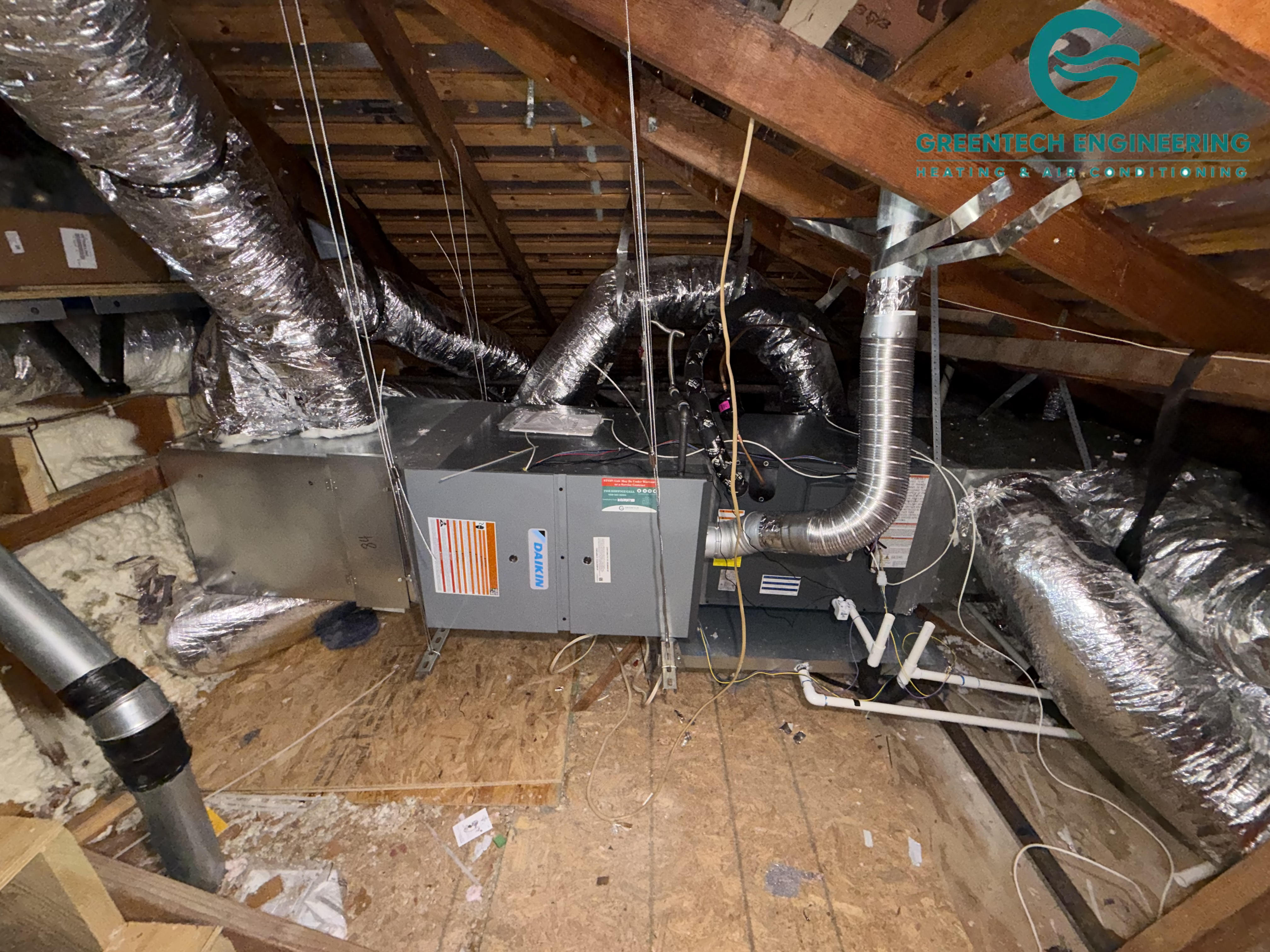 The new attic-mounted Daikin furnace and evaporator-coil assembly after plenum replacement, duct modifications, drainage work, and system setup.