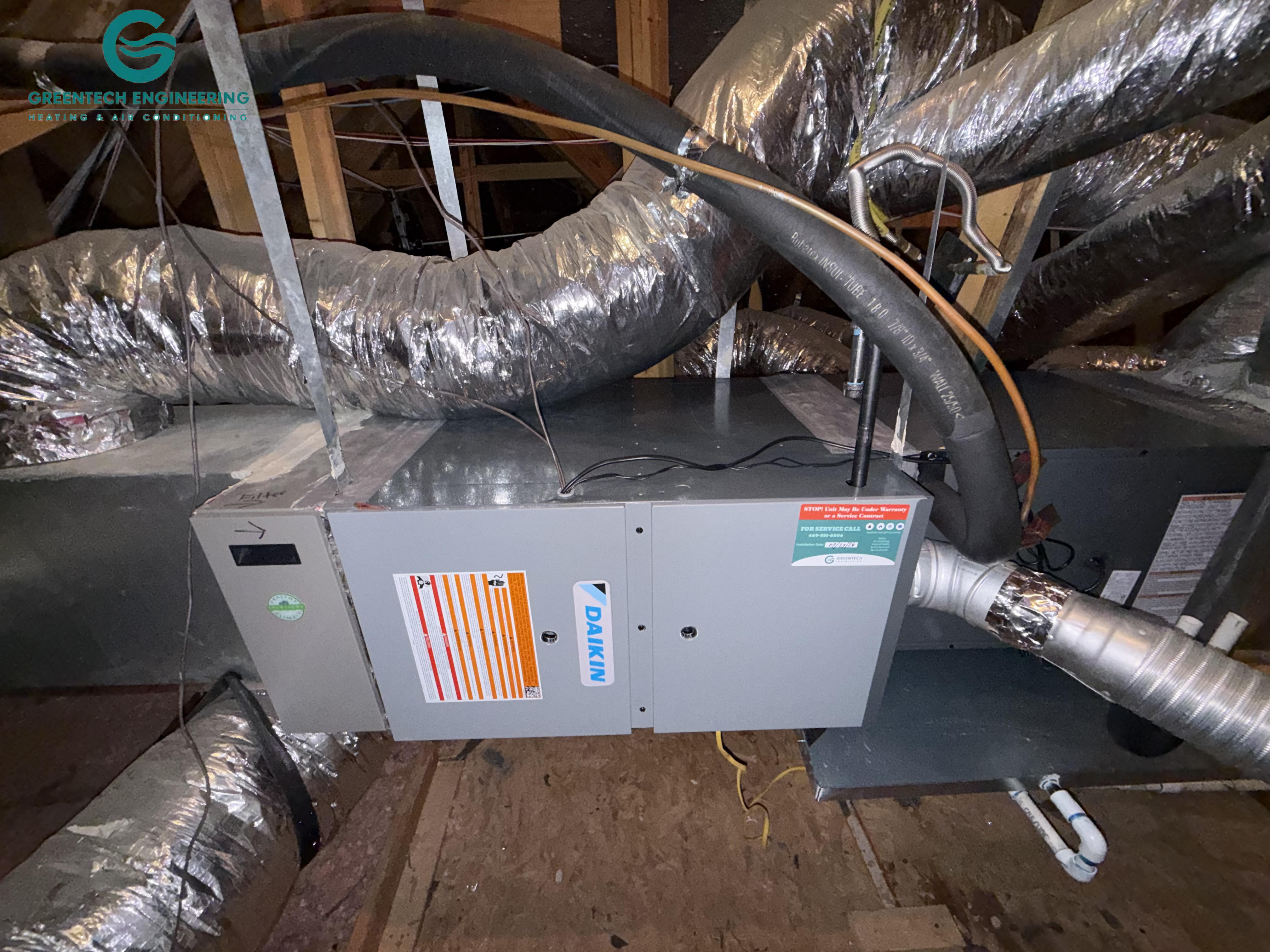 New horizontal evaporator coil and gas furnace installed in the attic