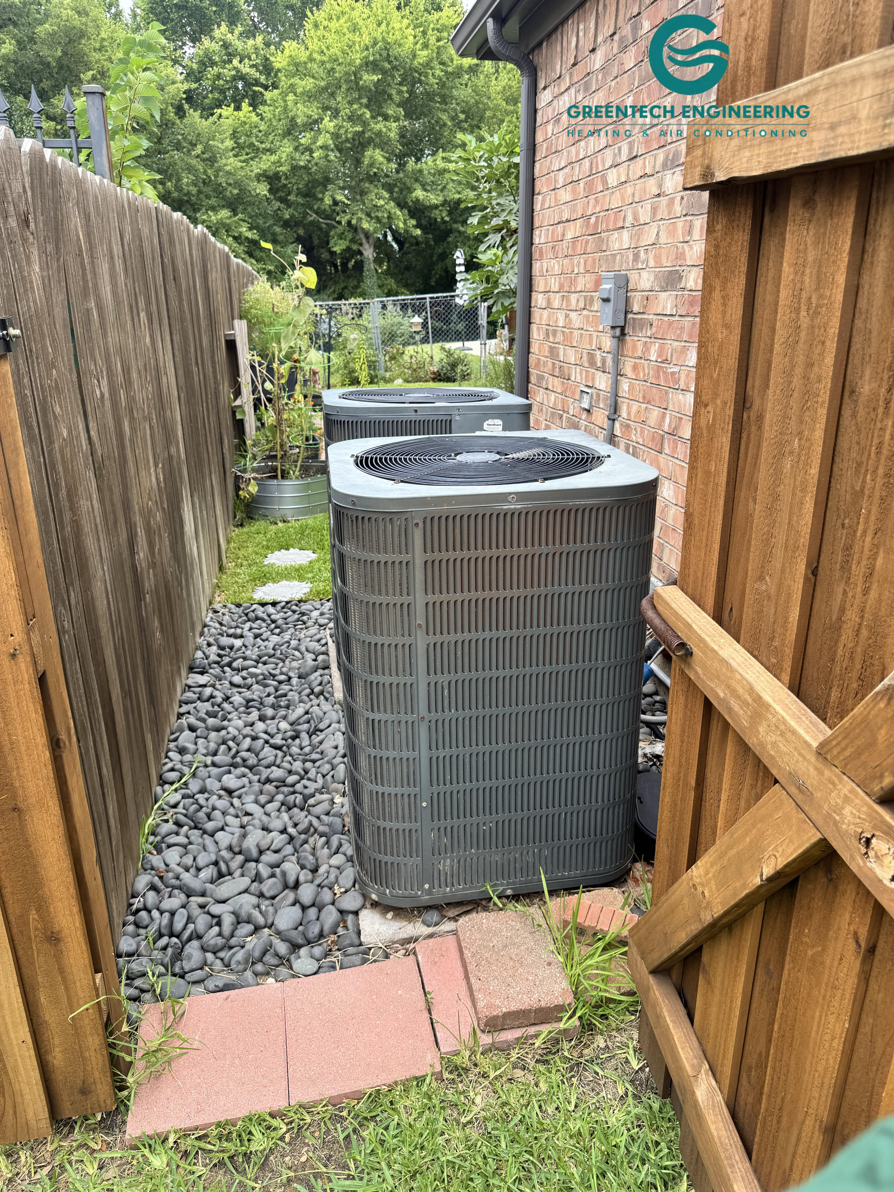 Two existing outdoor AC units before replacement at a Grand Prairie home