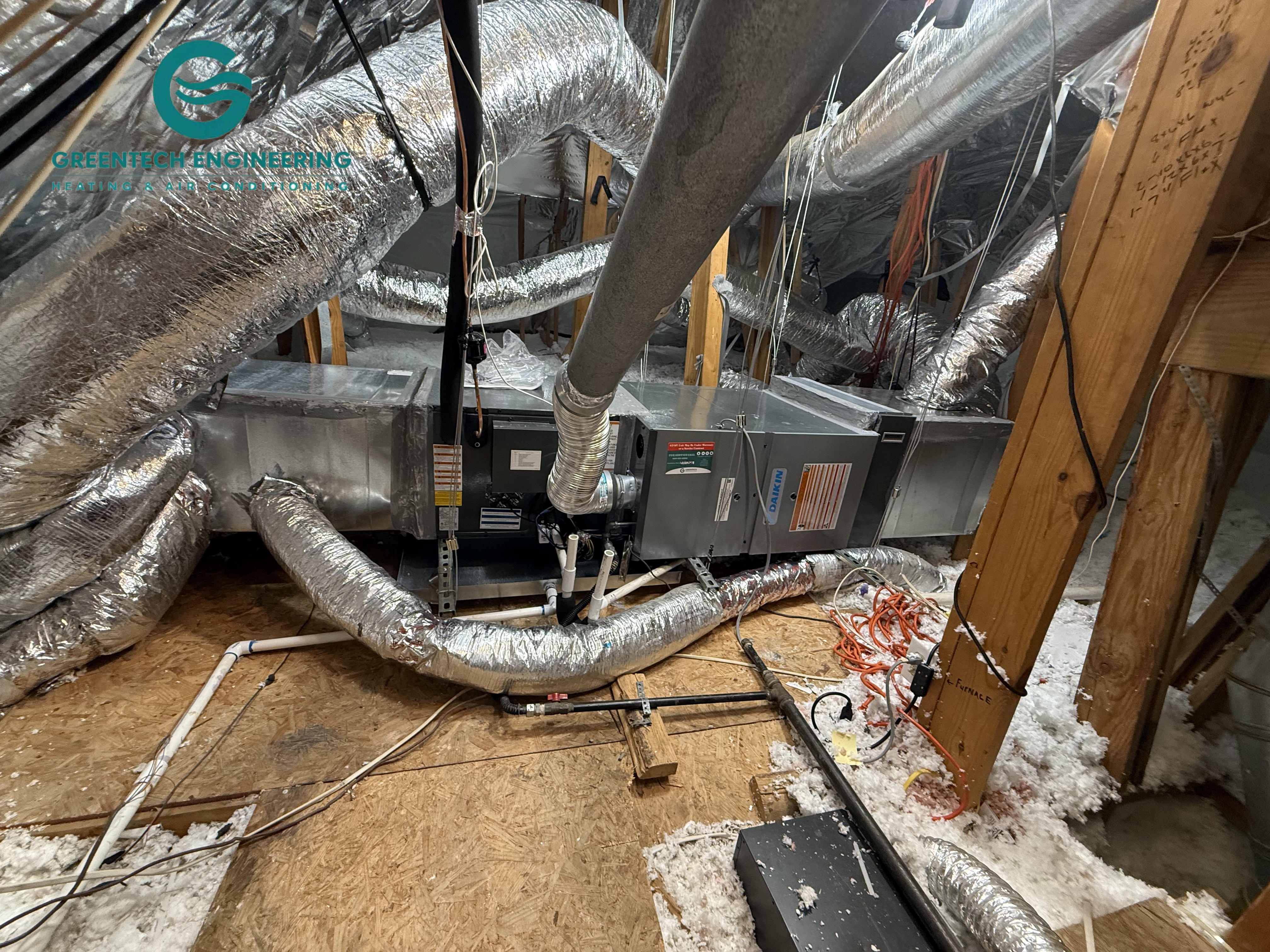 Upstairs Daikin furnace and coil installation in progress in a Coppell attic