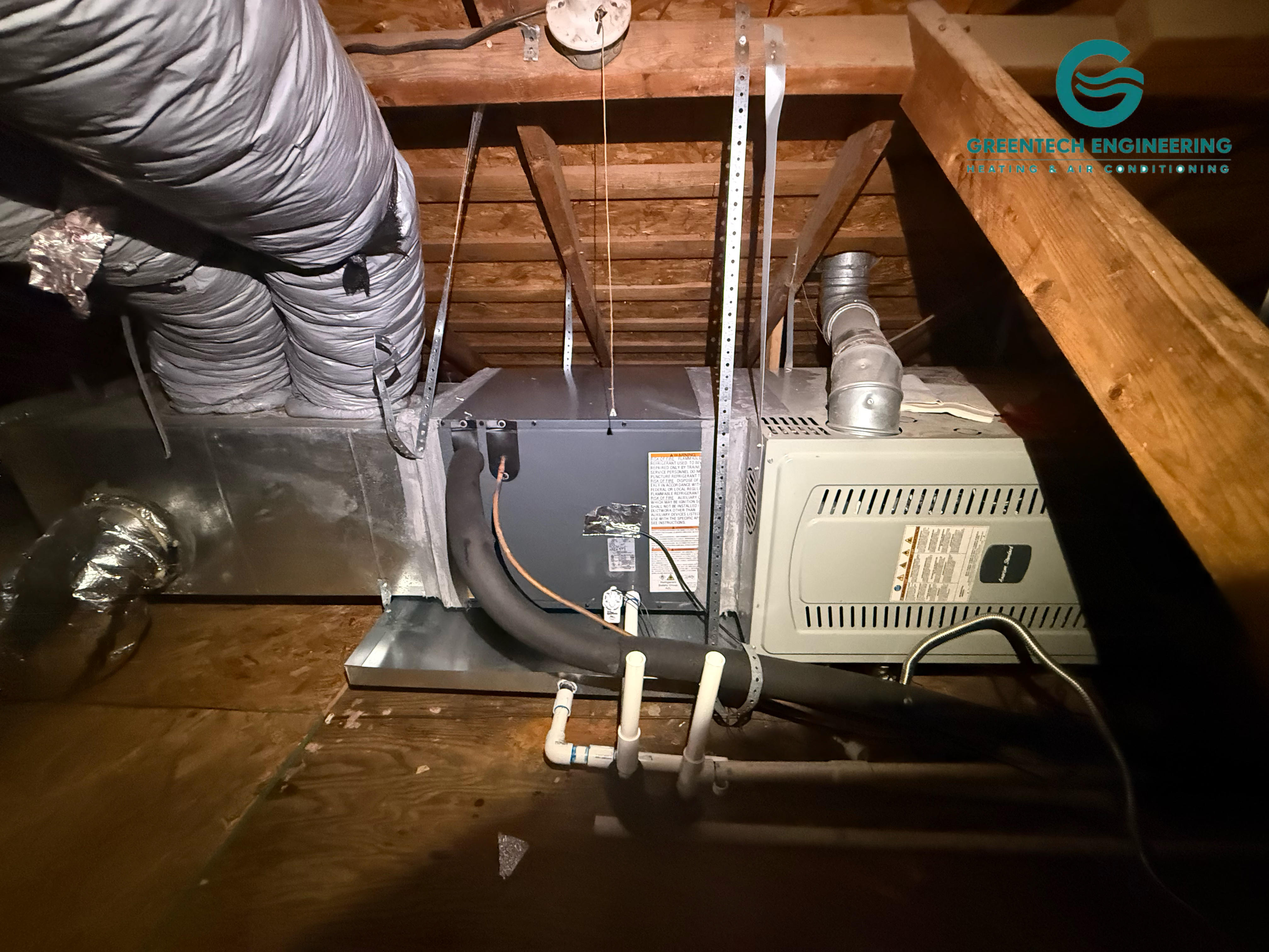 Daikin horizontal evaporator coil installed beside a retained gas furnace