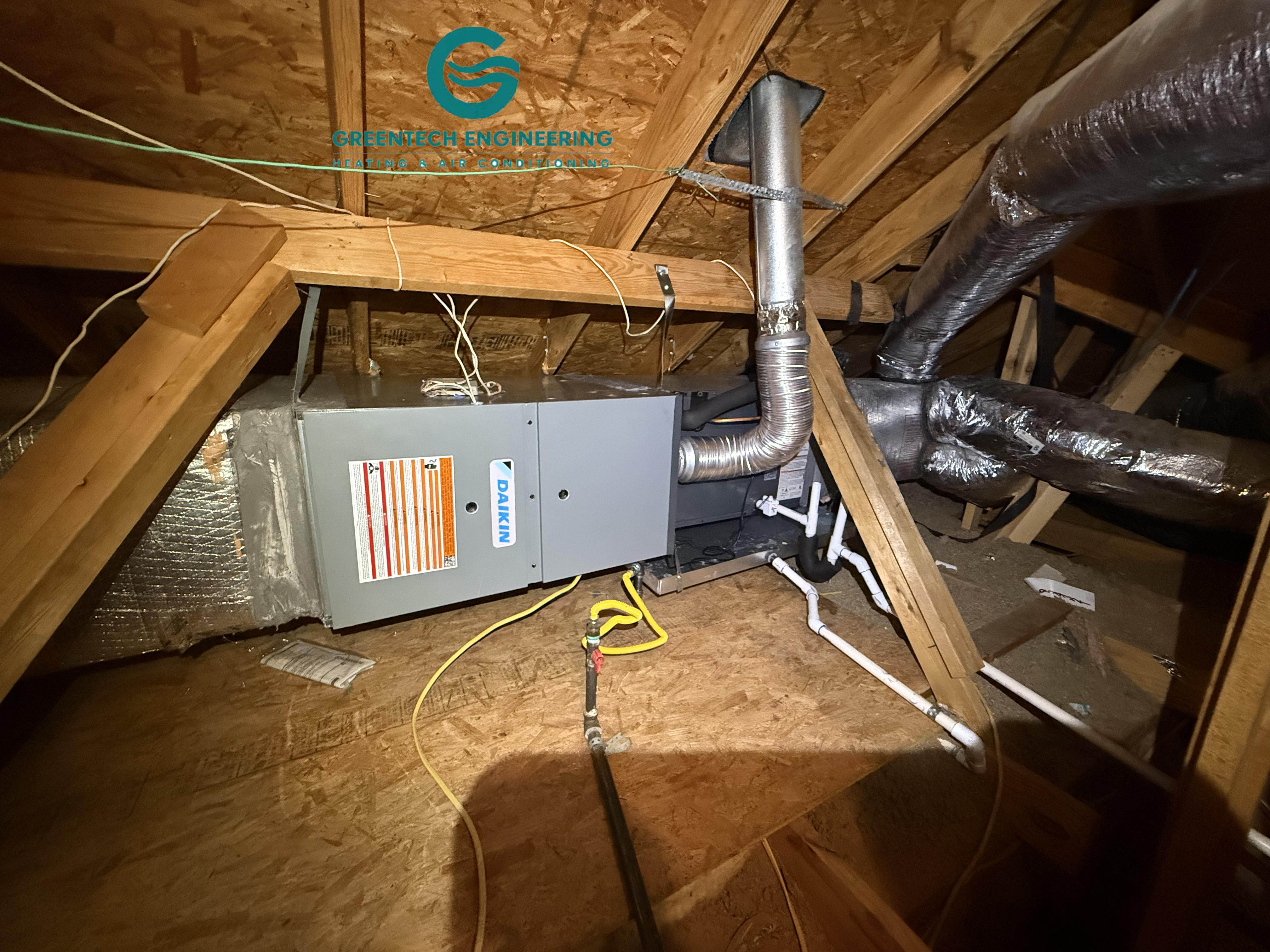 New horizontal Daikin gas furnace and evaporator coil installed in a Frisco attic