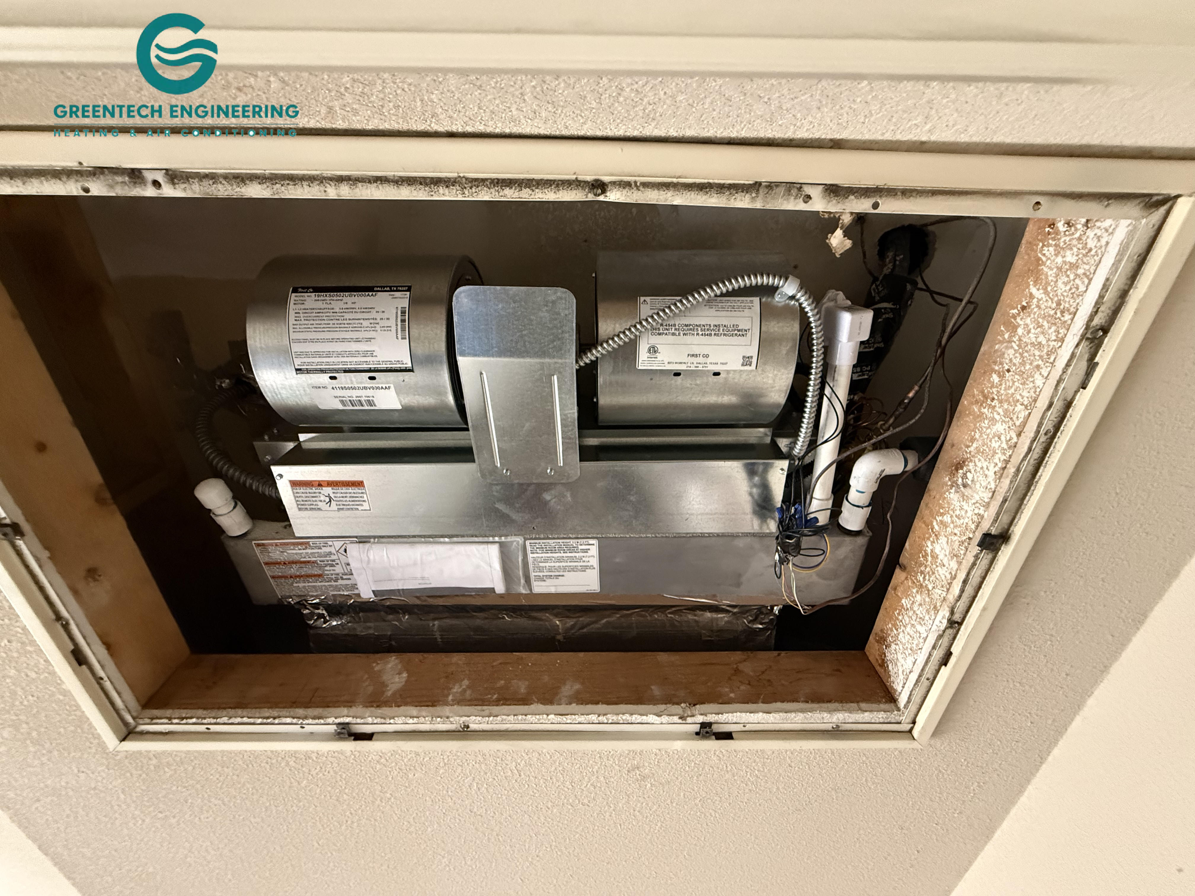 New First Co. ceiling air handler installed with a Daikin heat pump in Irving