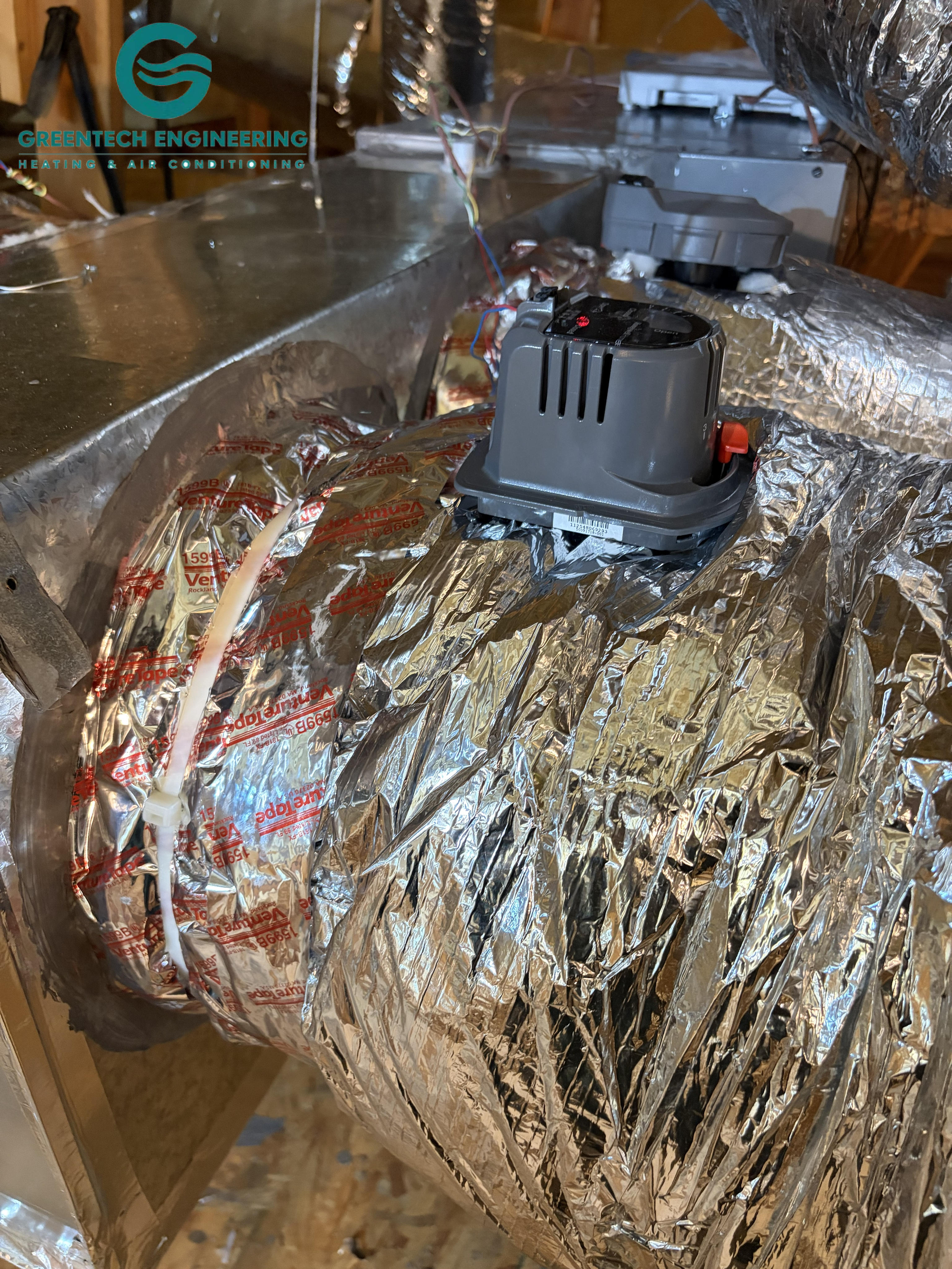 Second motorized HVAC zone damper installed during a Dallas 75248 airflow retrofit