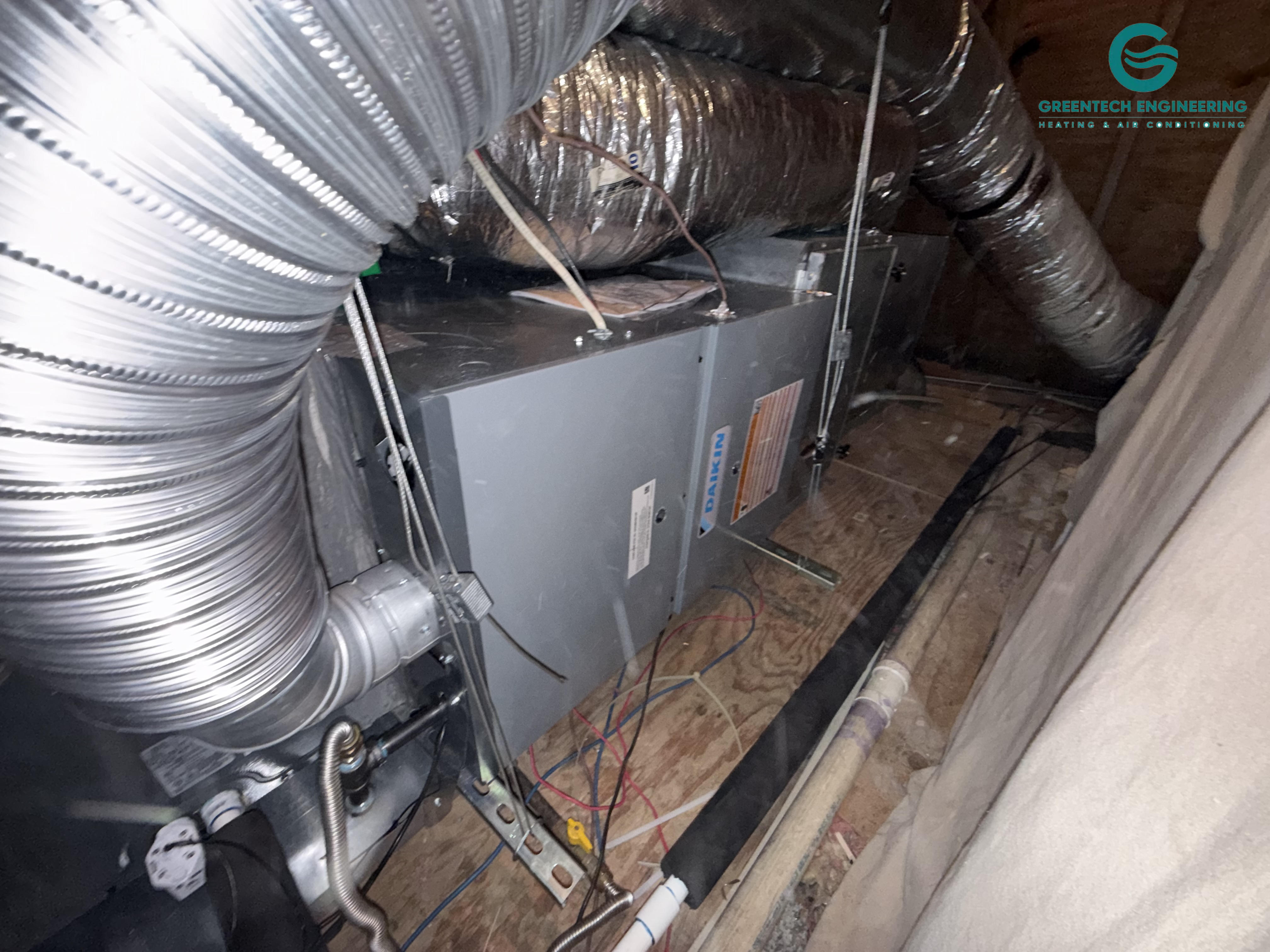 Horizontal Daikin furnace and coil installed in a Highland Park attic