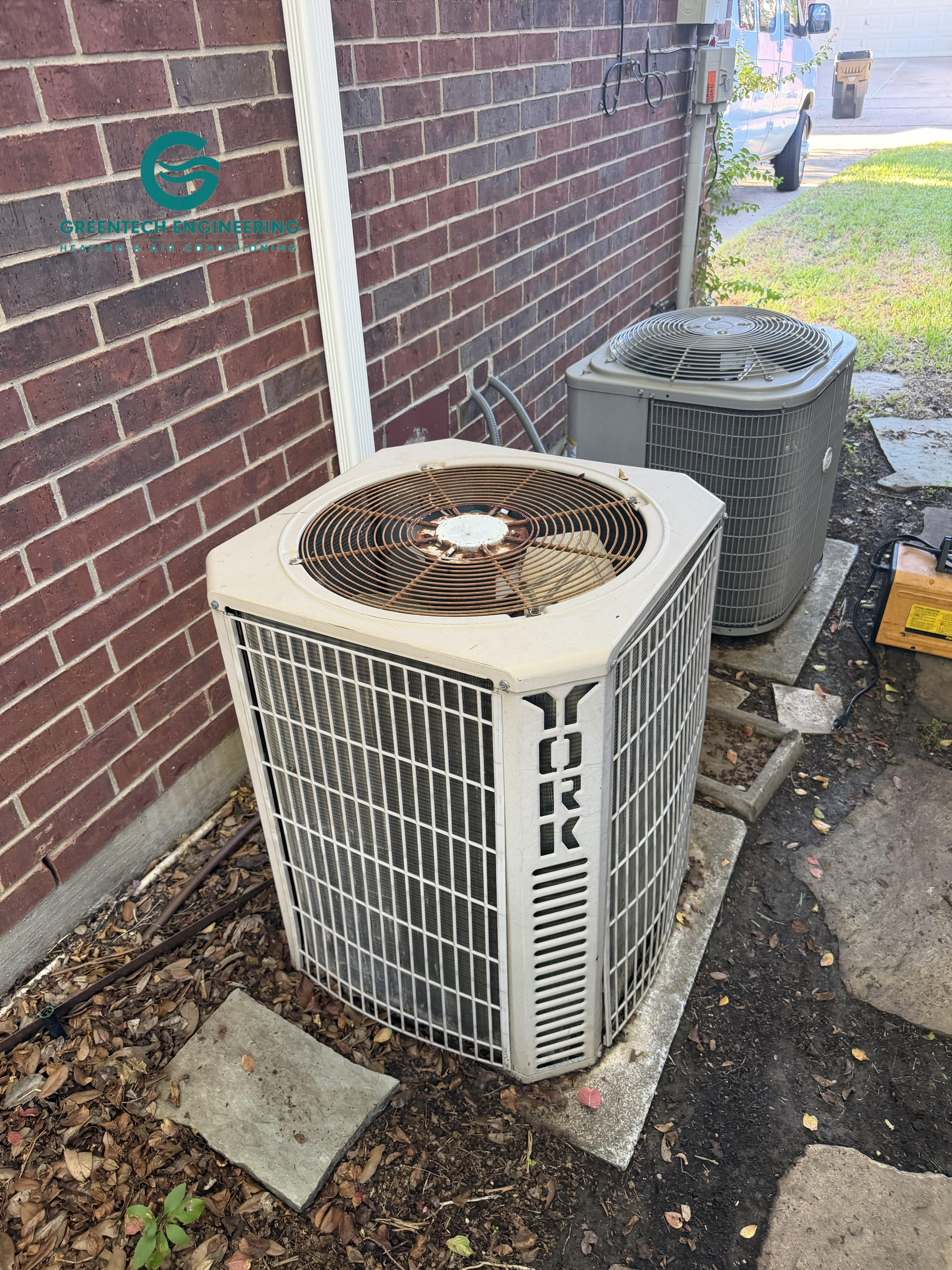 Weathered York outdoor condenser with visible surface corrosion before replacement
