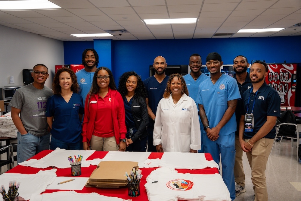 image of parents and staff discussing enrollment