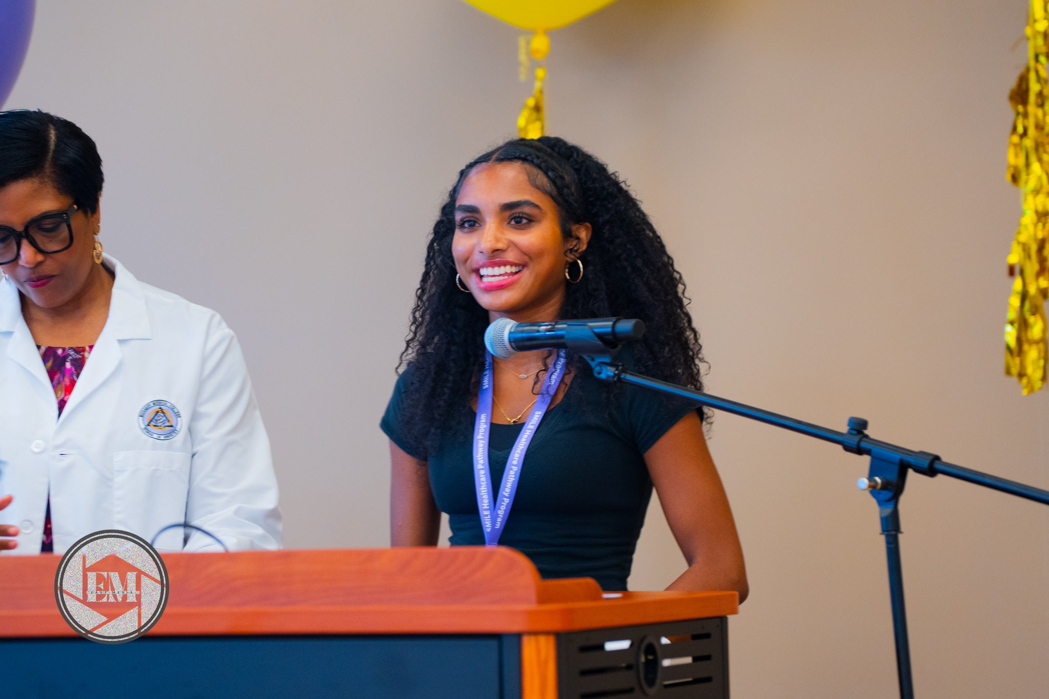 image of parents and staff discussing enrollment