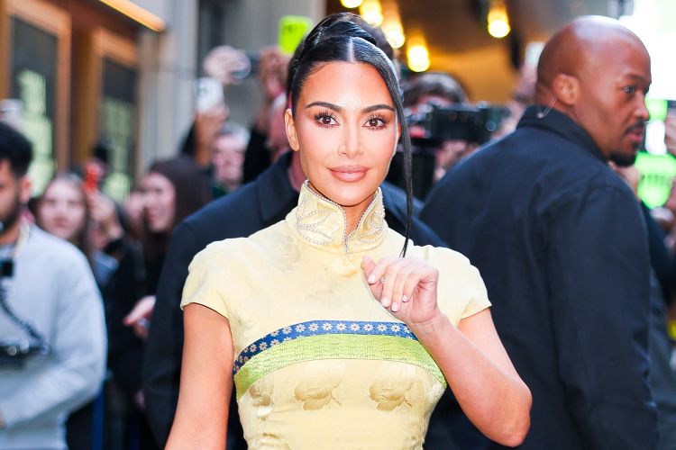 Kim Kardashian smiling at camera