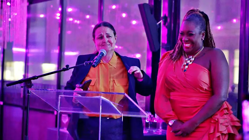 Marta Barreto on speaking on stage with Dr. Topeka K Sam at Awards ceremony