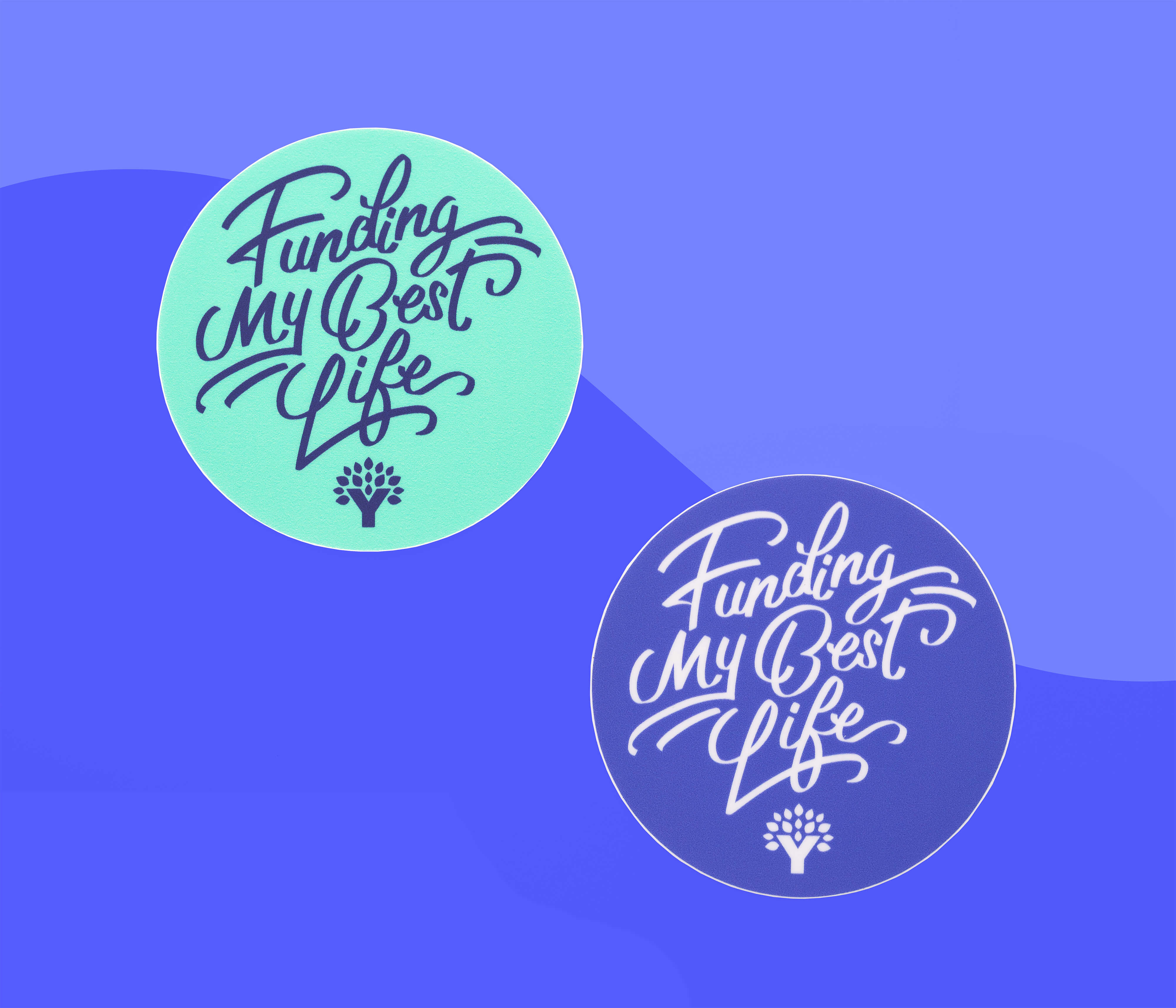 A teal and a dark blue sticker that both say 'Funding My Best Life' on a blue background.