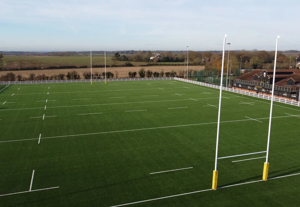 Newly completed rugby pitch with synthetic turf installed