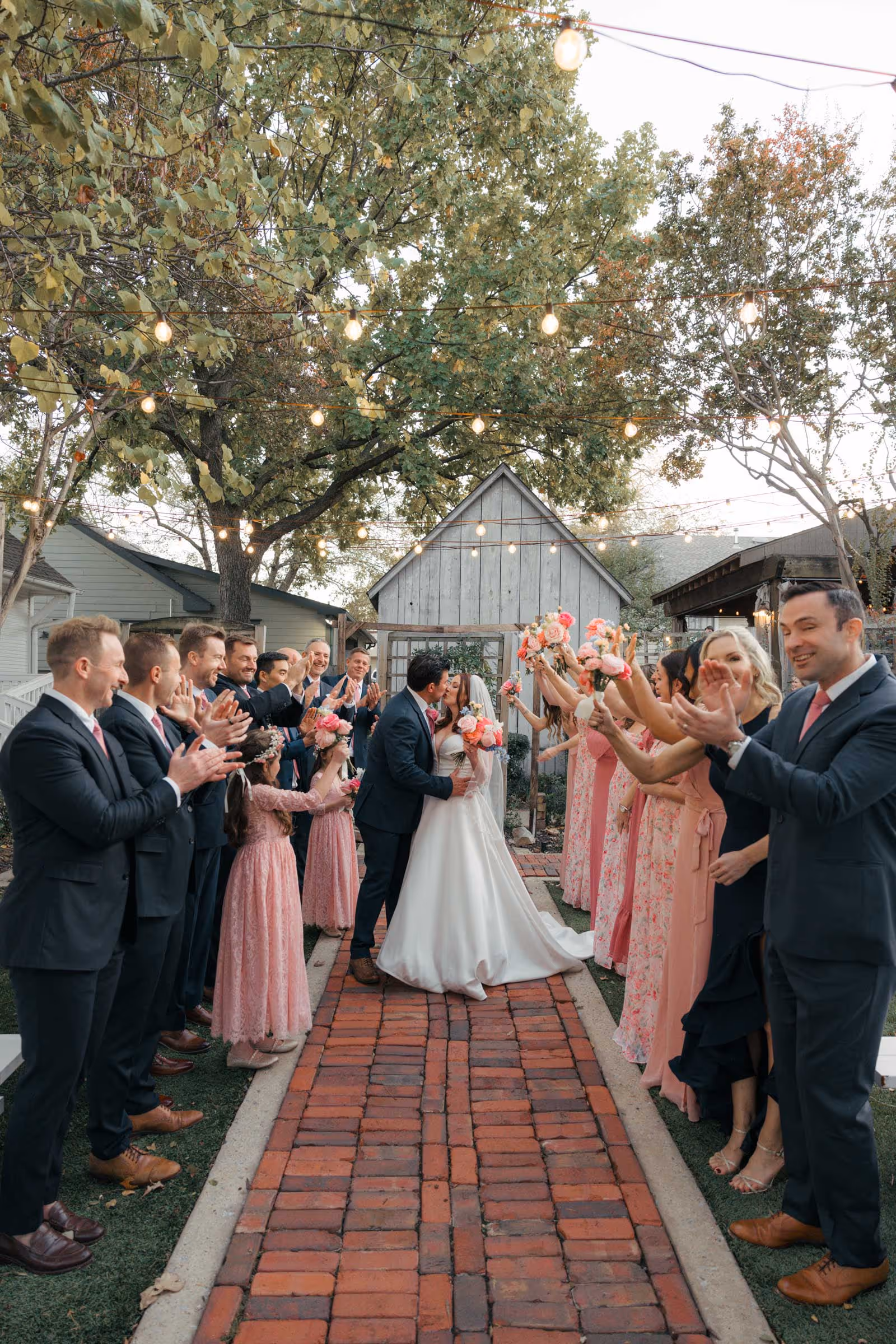 Wedding party celebrating a newlywed couple in the Chestnut Square garden