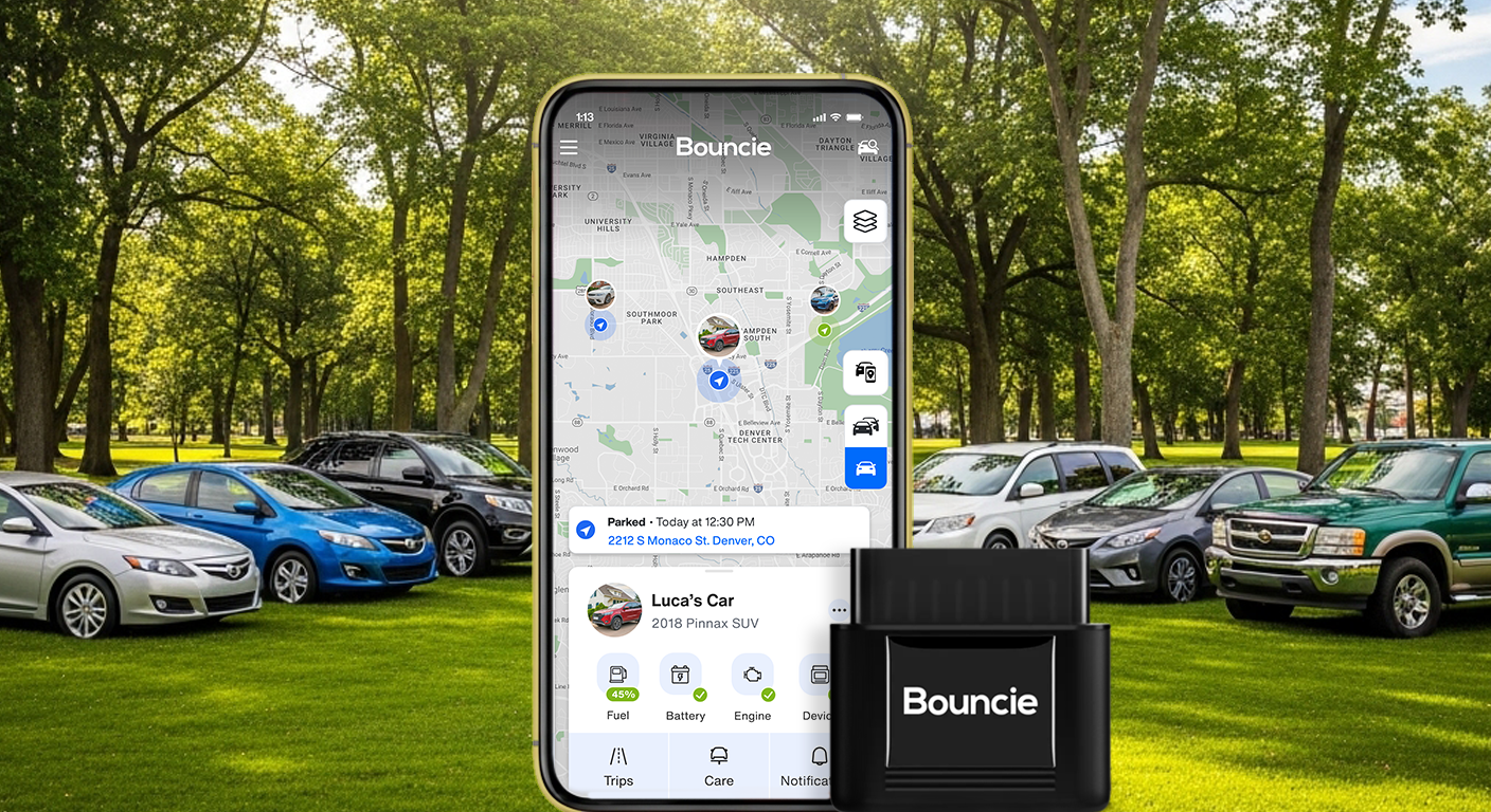 Multiple cars parked in a park setting behind a smartphone displaying the Bouncie real-time vehicle tracking app and OBD-II device.