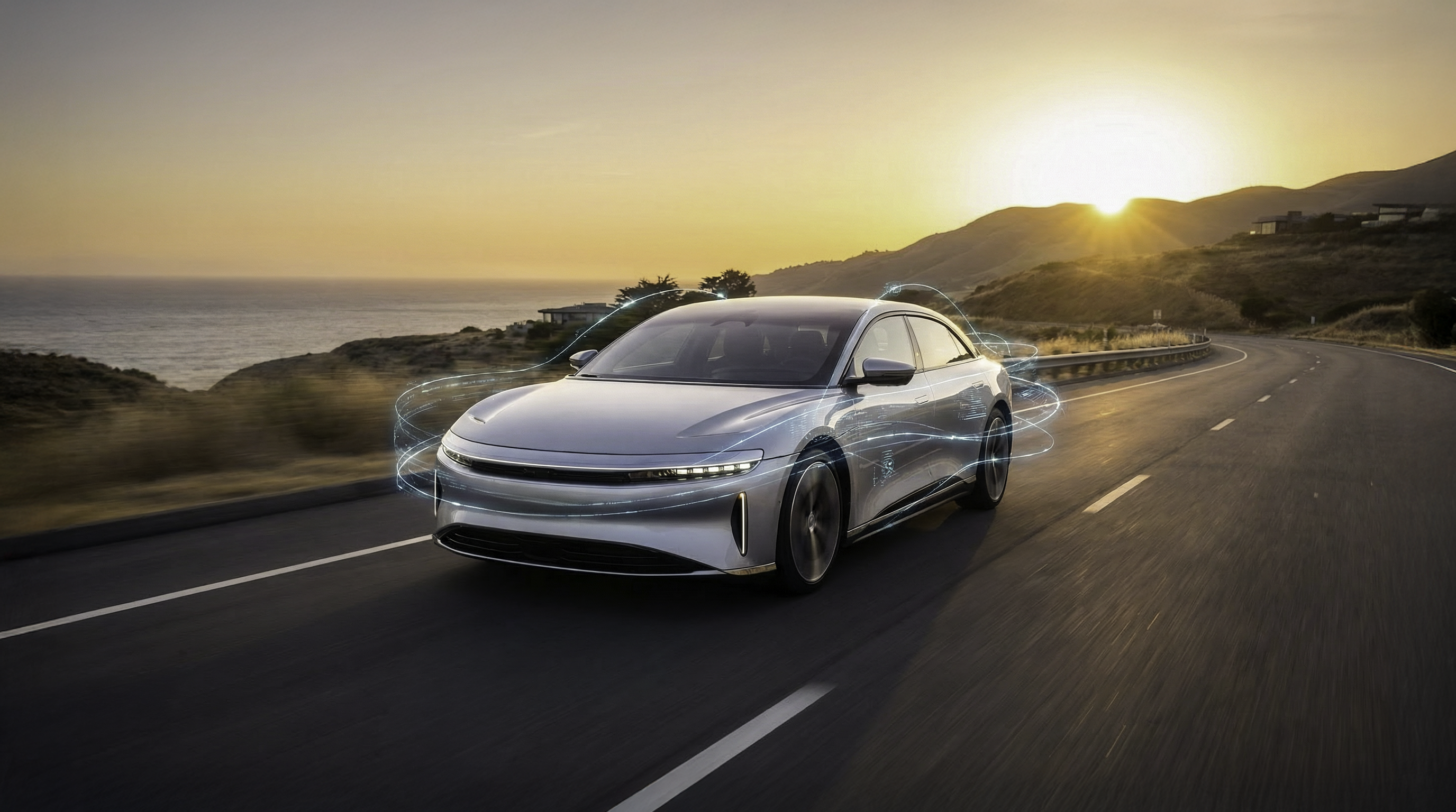 Modern vehicle using advanced vehicle telematics technology while driving on an open road at sunset