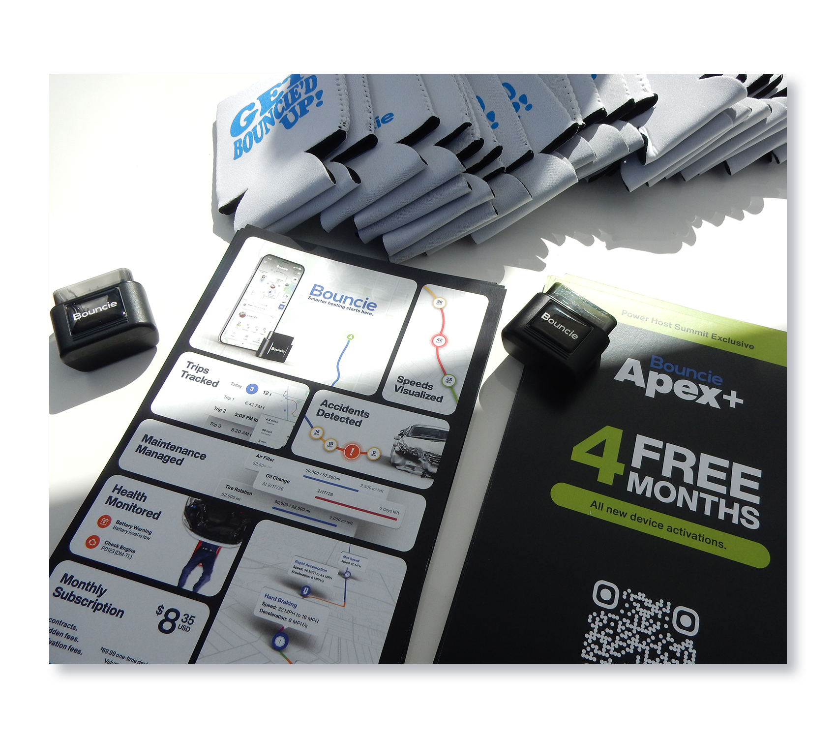 Bouncie GPS device and Apex+ promotional materials displayed at the 2026 Turo Power Host Summit