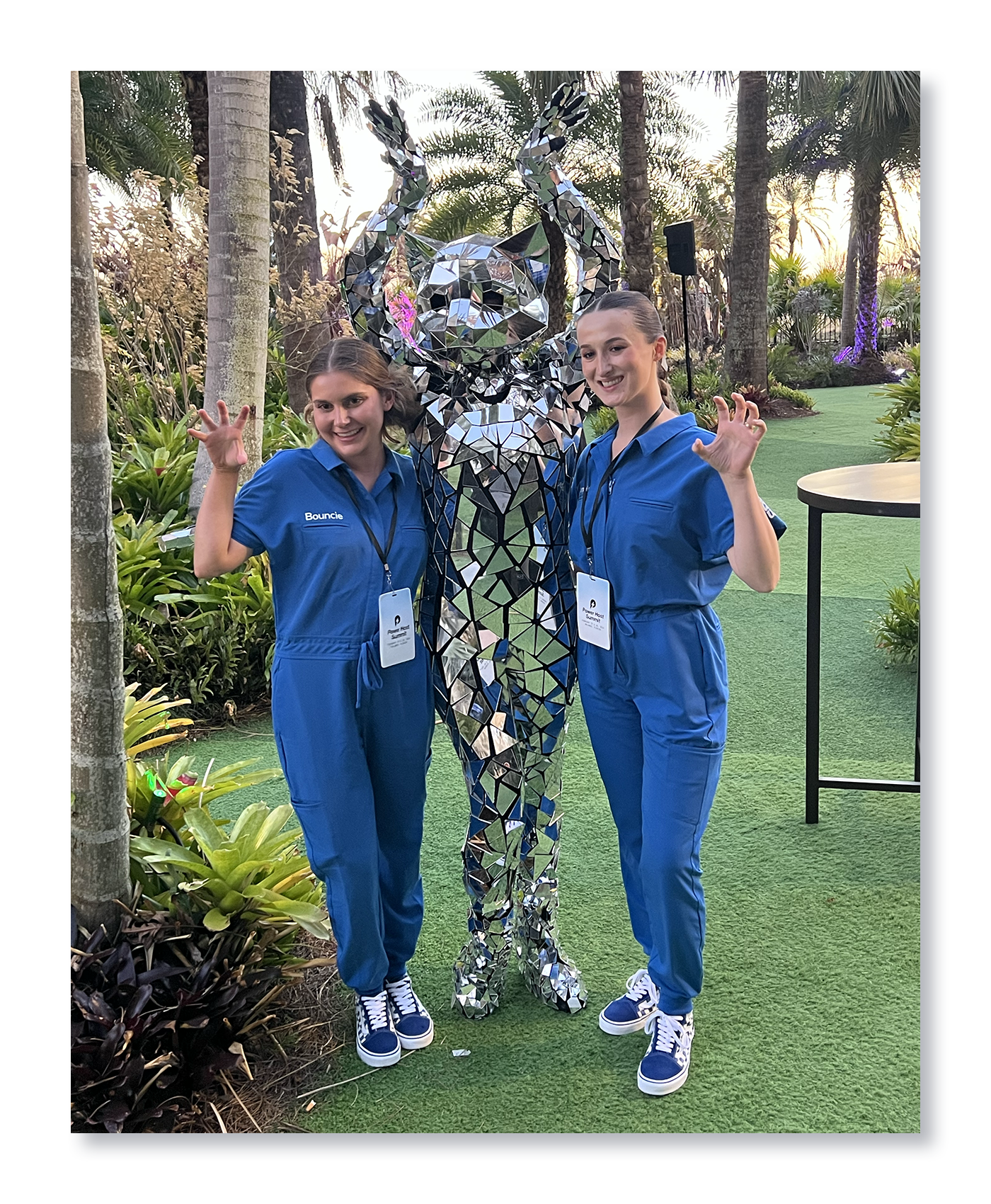 Bouncie team members posing with mirrored performer at the 2026 Turo Power Host Summit networking event