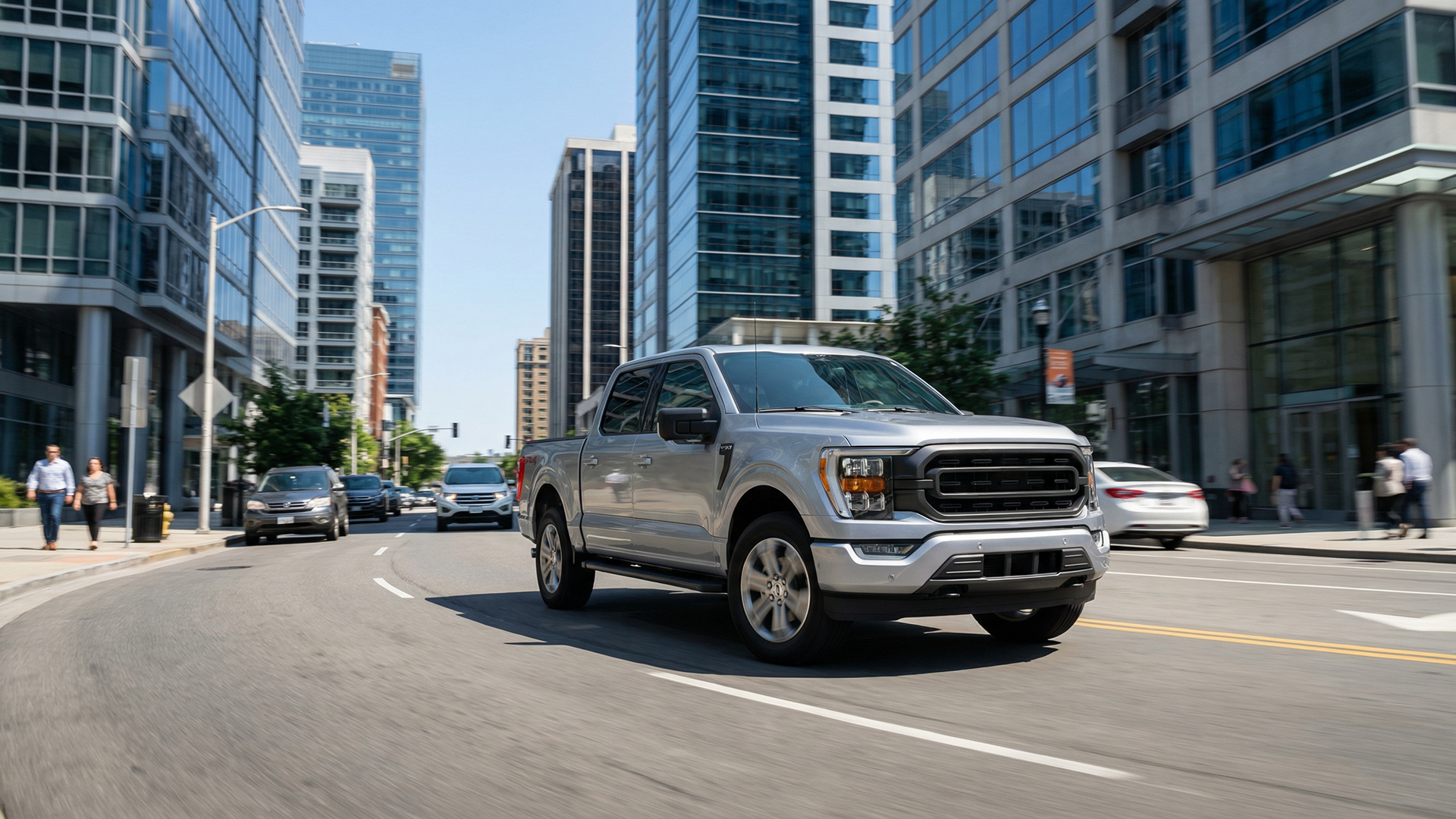 Silver Ford F-150 pickup truck driving through a downtown city street, illustrating GPS tracking for fleet vehicles