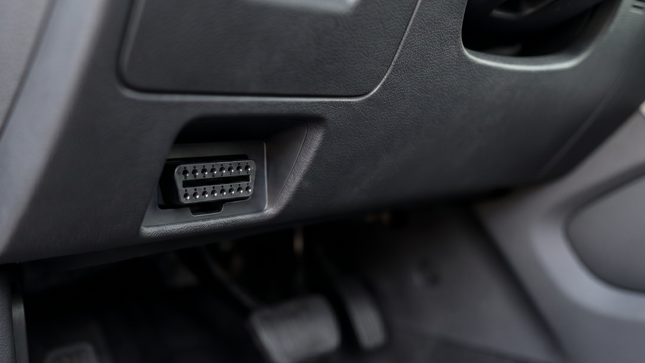OBD-II system port, a 16-pin connector under the driver's-side dashboard