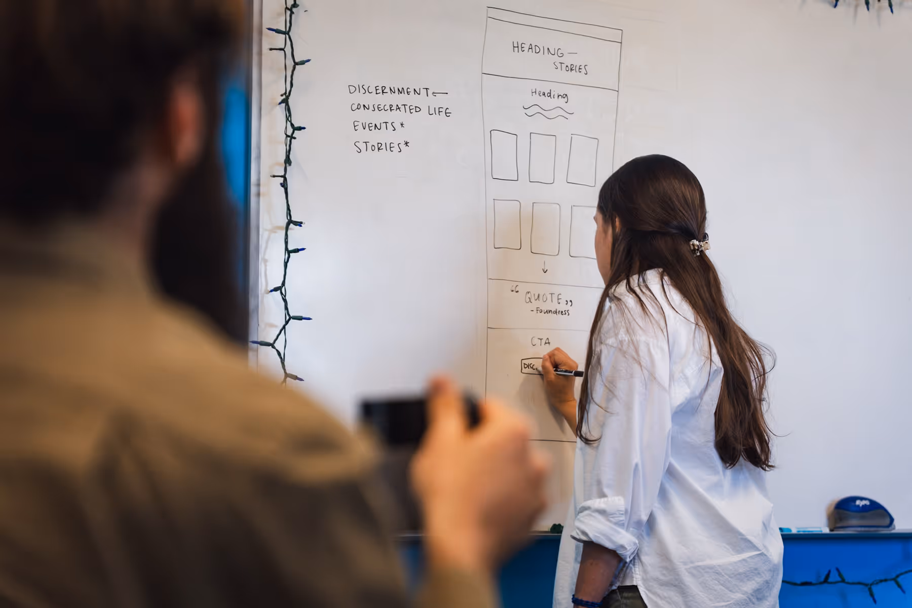 Our former employee, Kat Hurd (long may she reign), designing a beautiful website.