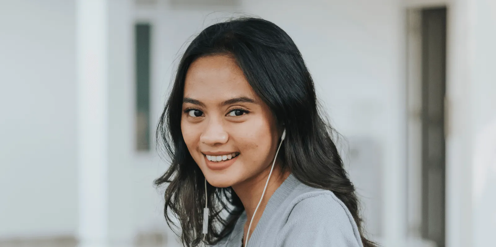 Woman with black hair.