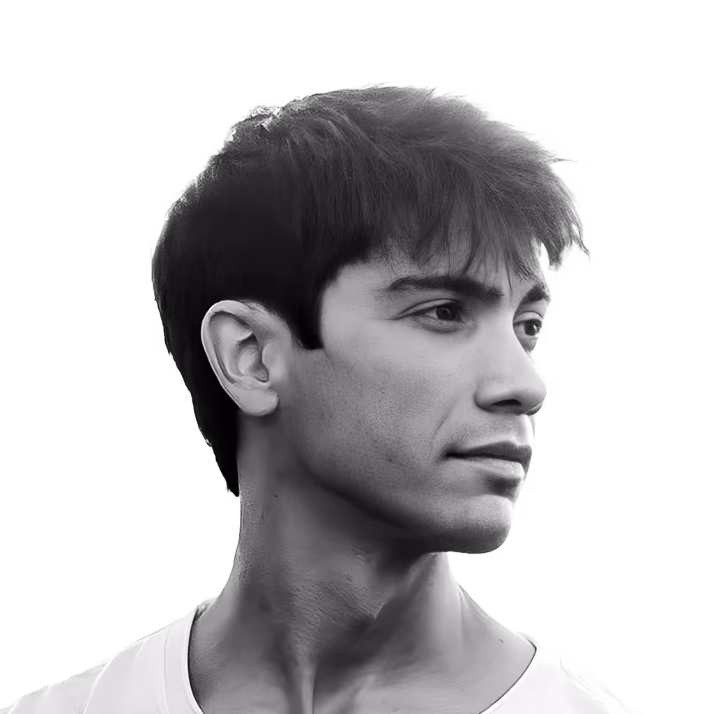 Black and white portrait of a young man with short hair looking to the right.