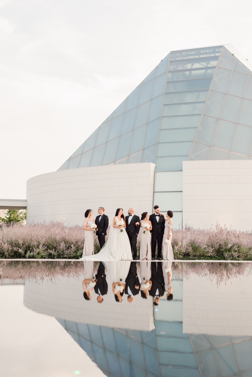 Couple enjoying their wedding reception with live entertainment at Aga Khan Museum