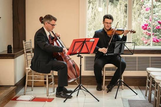 Paul Barna with DNA Project string ensemble