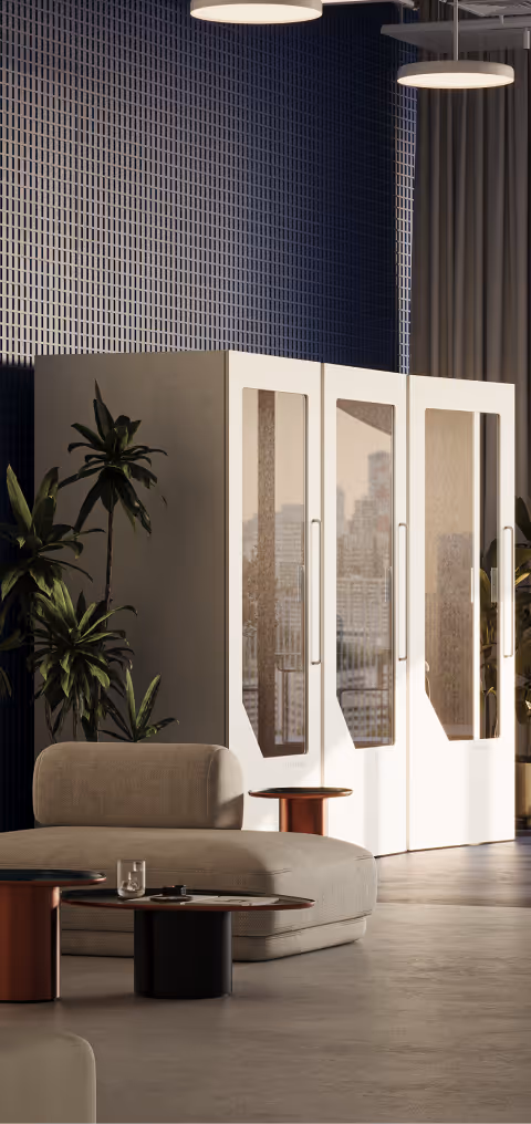 White Persy Booths wurden in einem modernen Büro mit Pflanzen und Lounge-Sitzgelegenheiten installiert