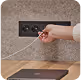 Power outlets with USB-C and USB-A ports inside Persy Booth for device charging