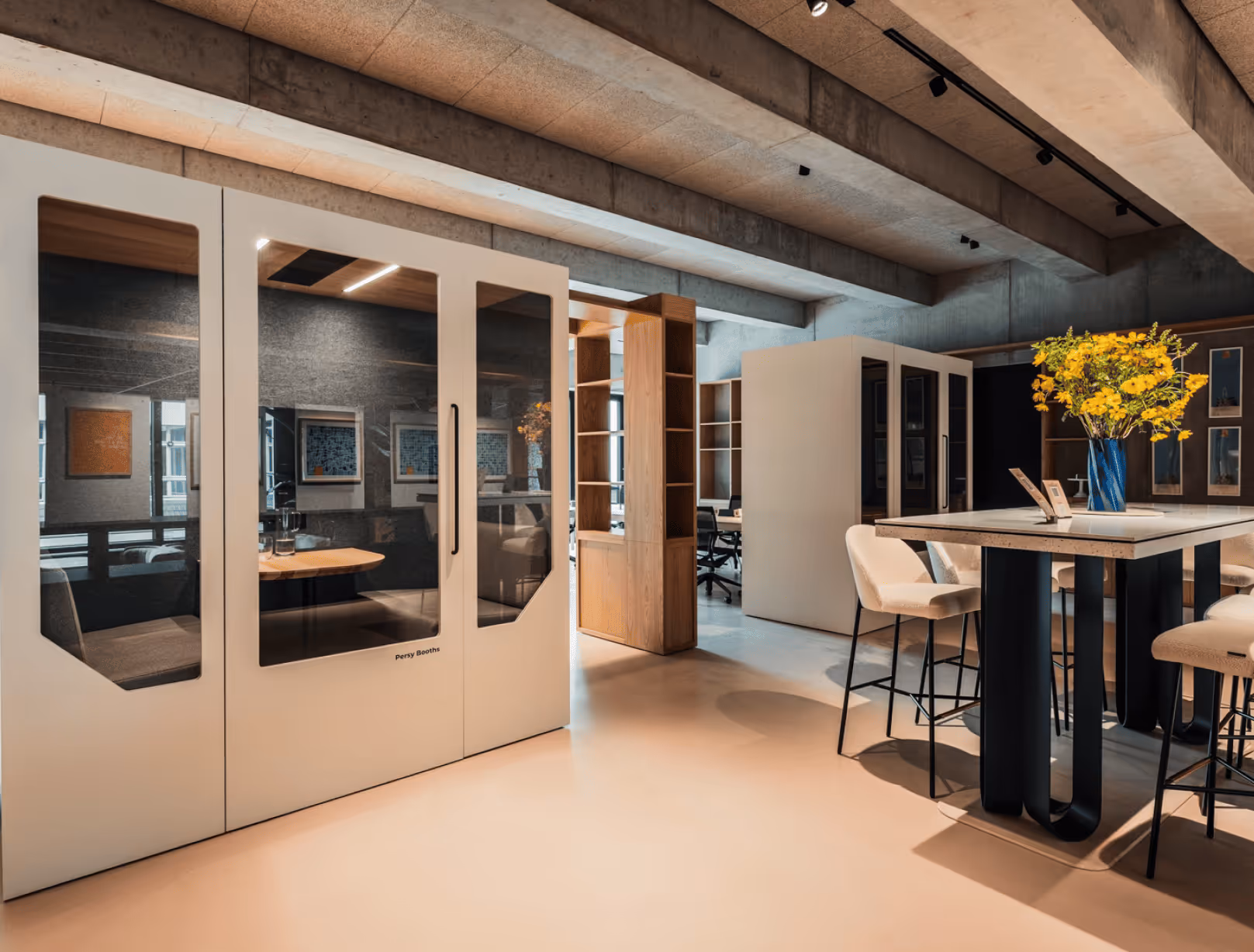 Modern office phone booths with glass doors and acoustic design for private meetings in coworking space