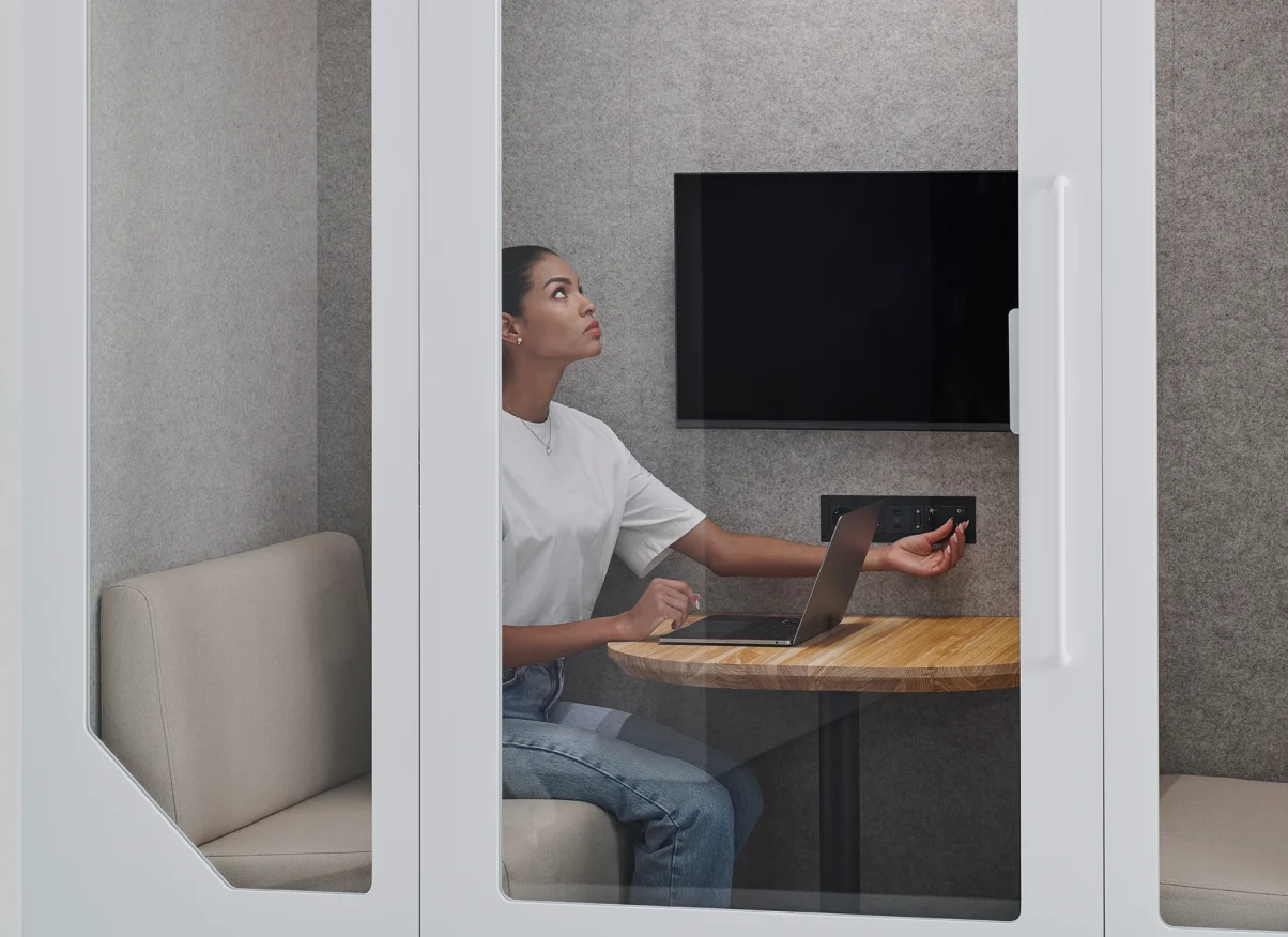 Cross-section of Persy soundproof office booth wall showing multi-layer acoustic insulation achieving -28 dB speech reduction, ISO-certified for professional workspace noise control.