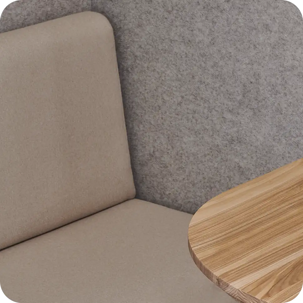 Two ergonomic seating areas inside Persy Booth for comfort