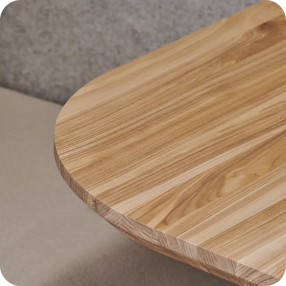 Hardwood table inside Persy Booth for work essentials