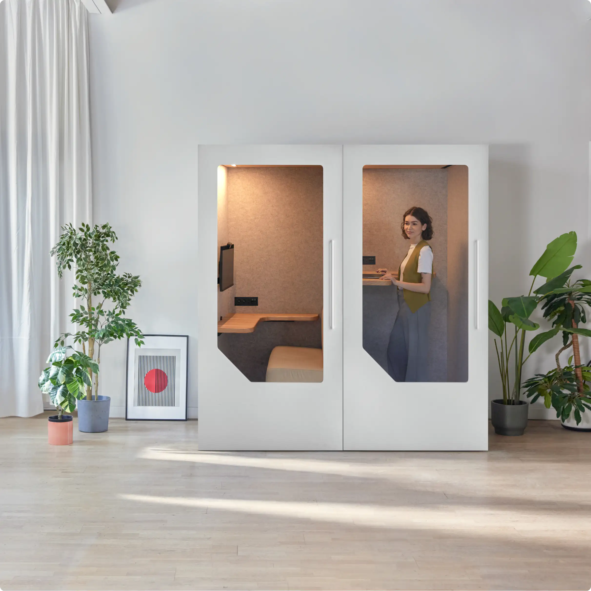 Person working inside a Persy Booth with fresh air ventilation for extended sessions