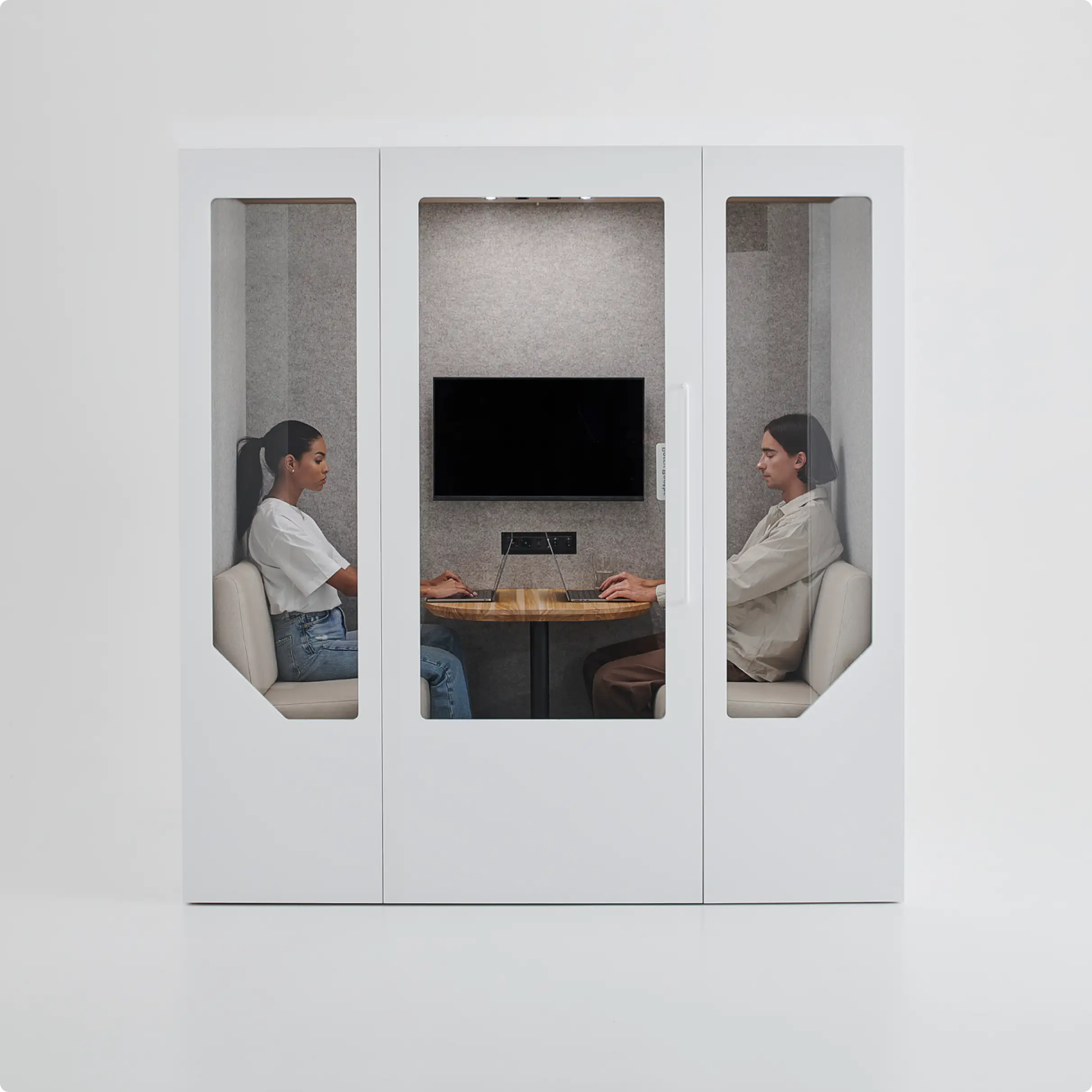 Two people working inside of Persy Two Soundproof Office Booth