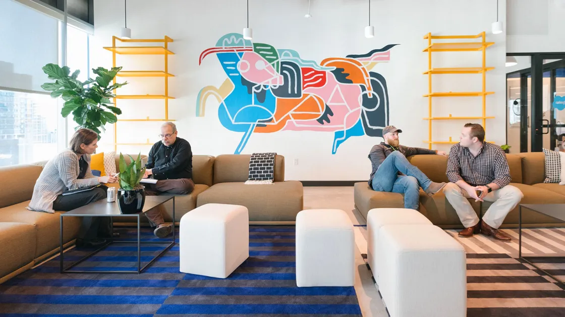 4 People are Working in Collaborative Workspace