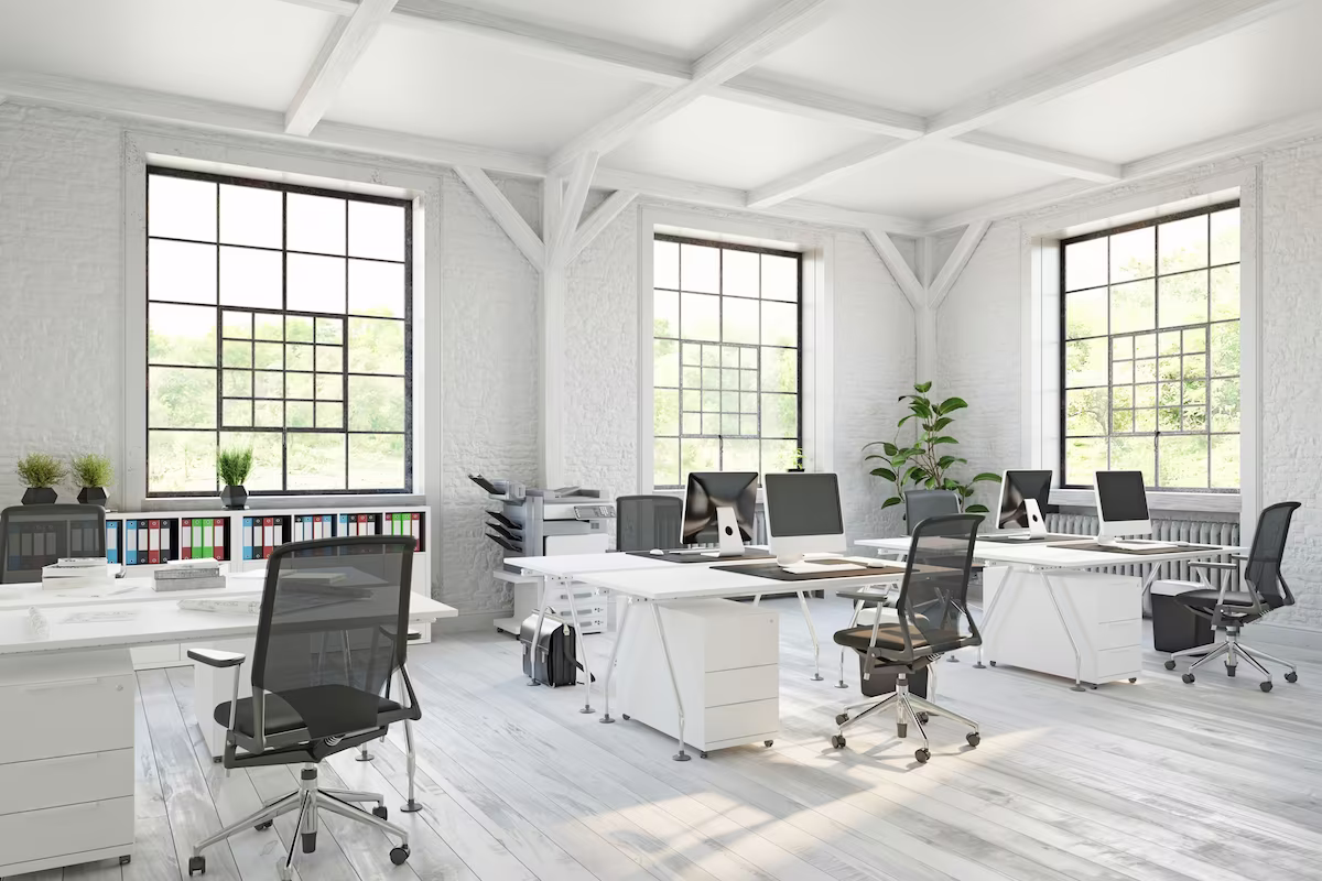 Bright open-plan office illustrating typical space allocation per employee