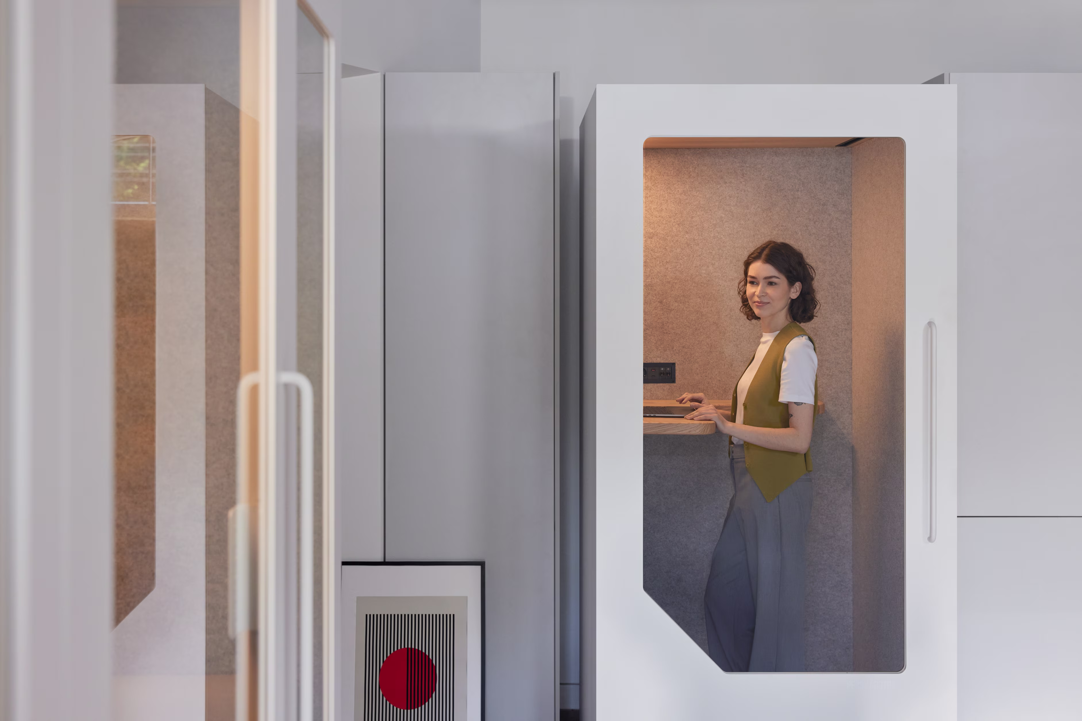 A person working inside Persy Booth