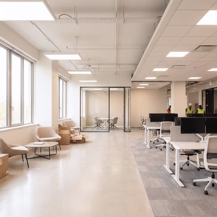 Modern open-plan office space partially furnished and ready for occupancy after fit out