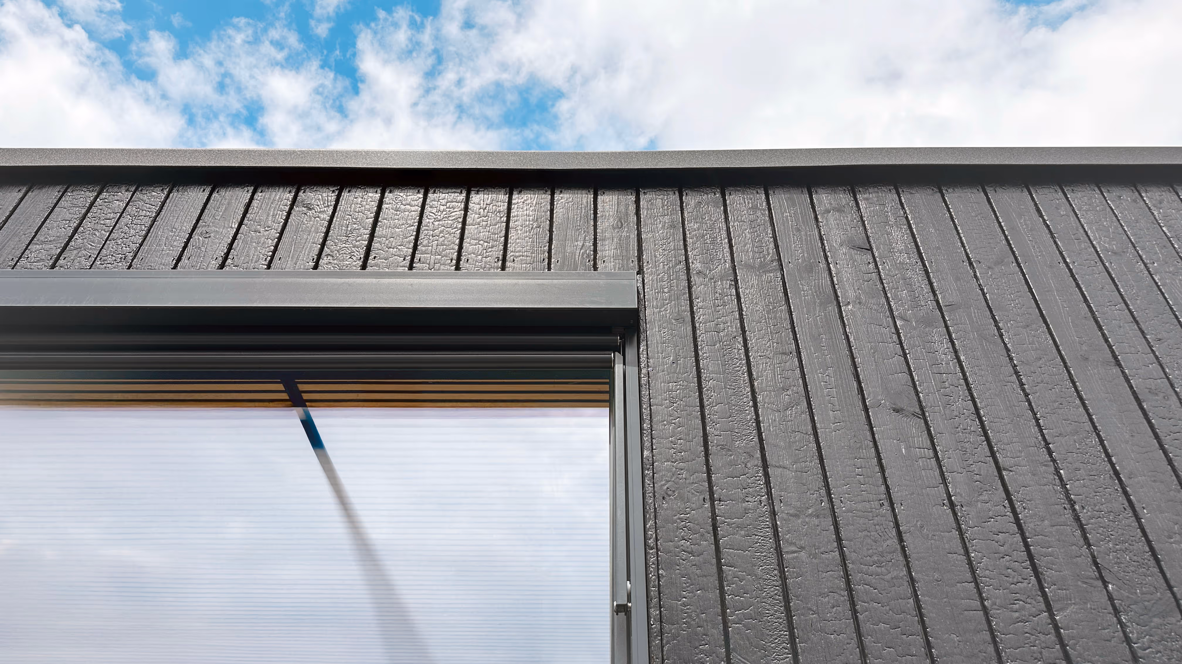 BIOBUILDS sustainable modular home surrounded by natural landscape