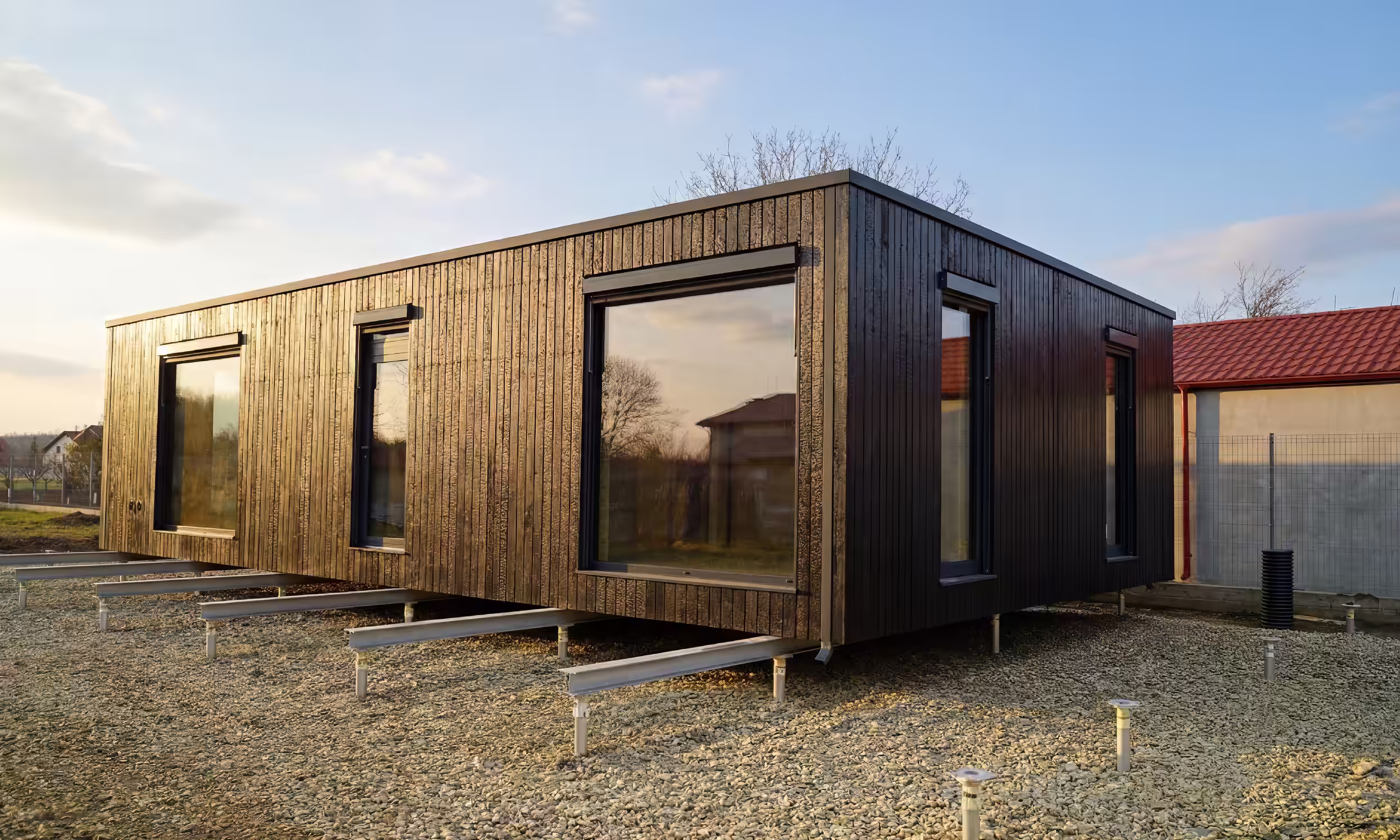 BIOBUILDS factory floor showing prefab home production