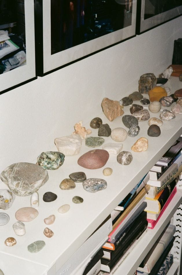 A group of rocks on a shelfDescription automatically generated