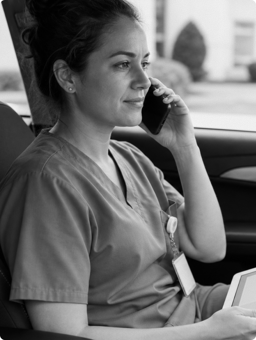 Clinician taking a call, tablet in hand