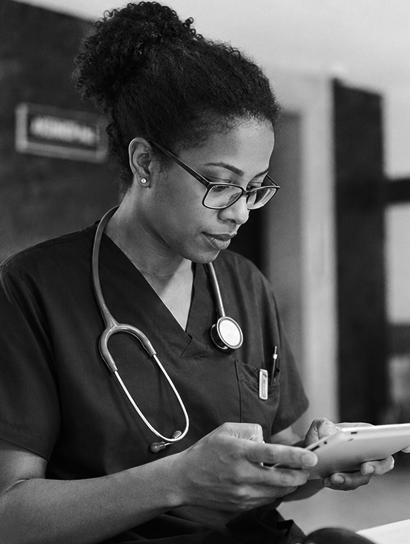 Clinician reviewing a patient chart on a tablet