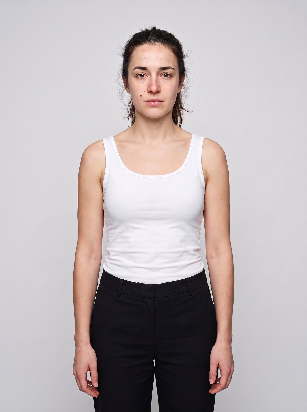 Realistic AI fashion model casting portrait generated in Create Image, with prompted asymmetries, freckles and natural skin detail