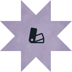 Black icon of a fan deck of color swatches centered on a purple, eight-pointed star background.