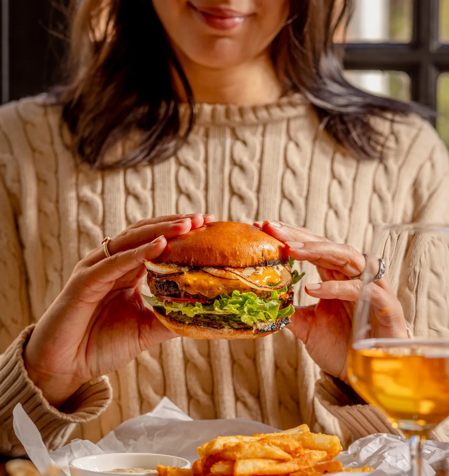 Guest eating a burger