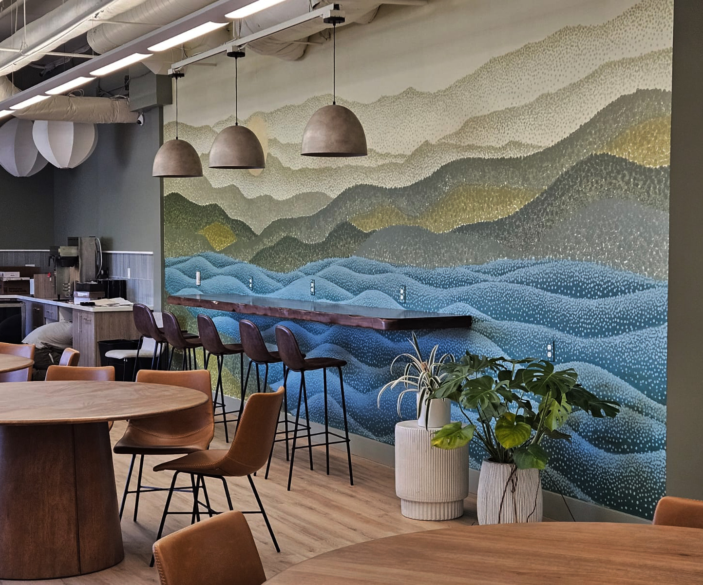 Minimalist mural for meditation room incorporating earth tones and sacred symbols